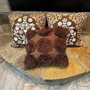 Set Of Three Decorative Pillows. Brown And Pink Rose Appliqué